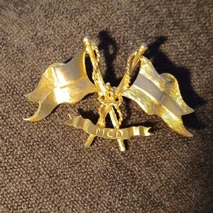 Gold Flag Brooch with MCD Inscription